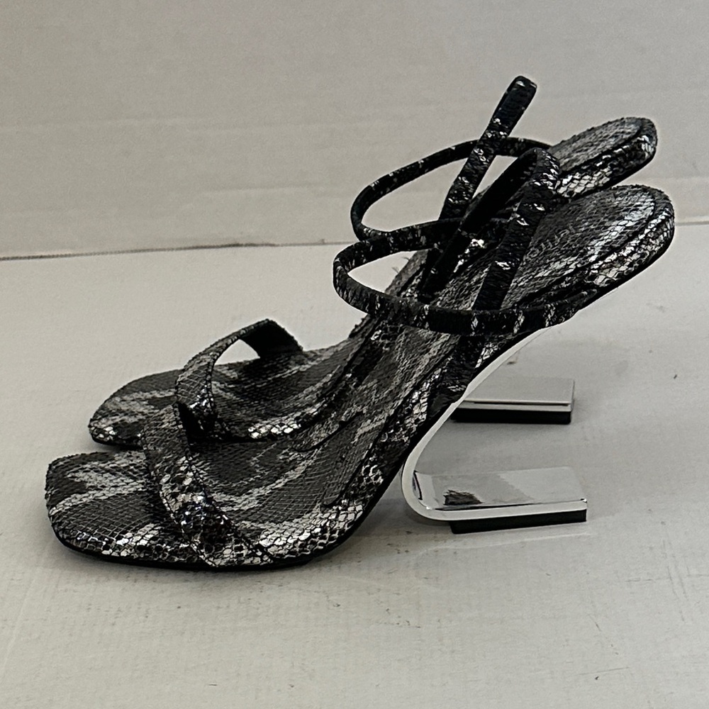 Jefferey Campbell sandals with metallic sculptural heel and a snakeskin upper 9